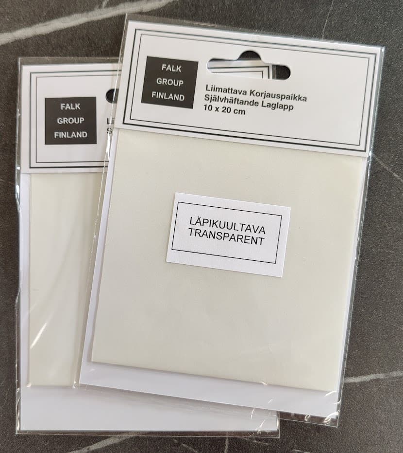 Läpinäkyvä tarrapaikka